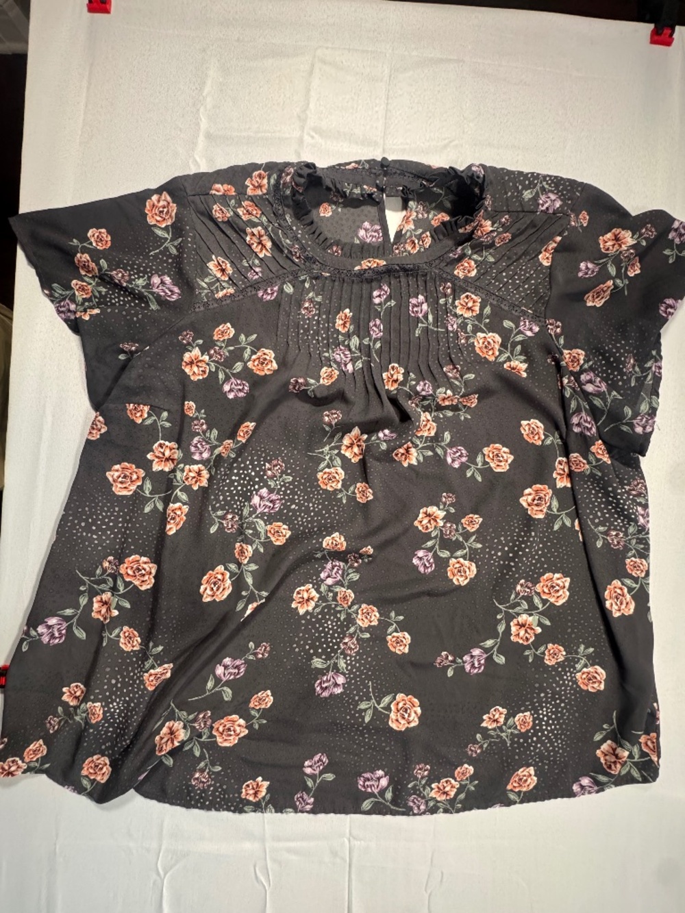 Torrid size 4 (gray floral smocked short flutter sleeve top)